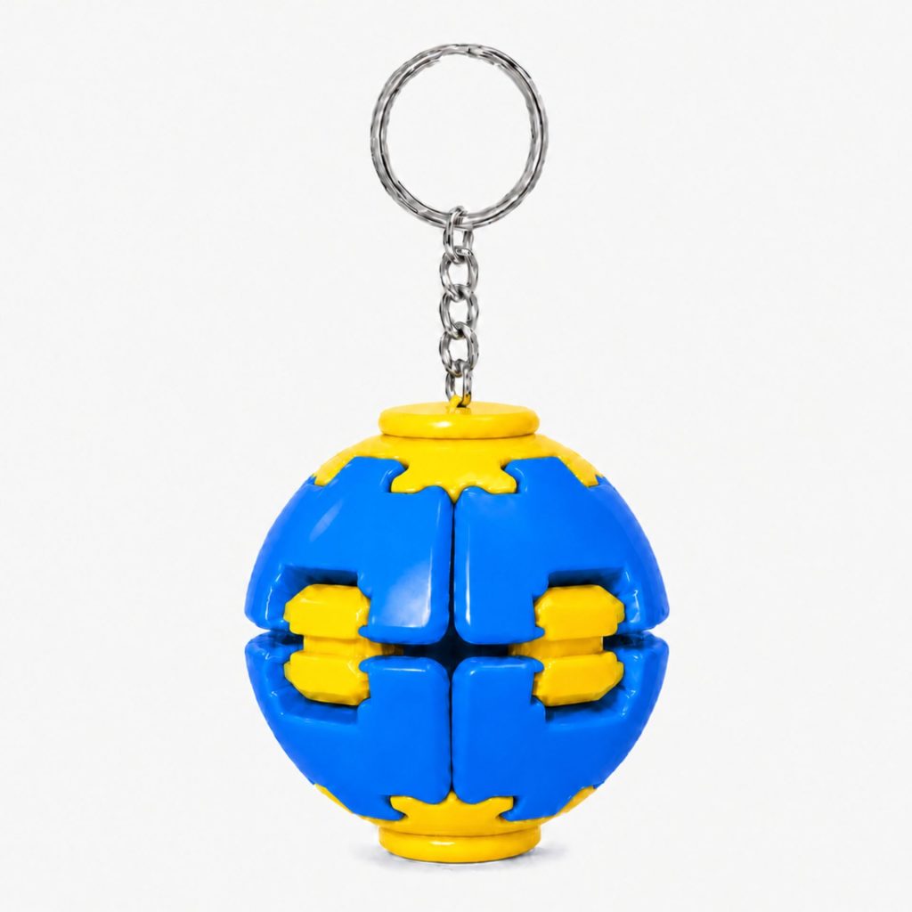 Denumire recomandată:  Minge Senzorială Antistres Rotativă 3D, Flippy, Tip Fidget Spinner, cu Breloc și Sistem Push and Spin, 4.5x5 cm, Albastru și Galben